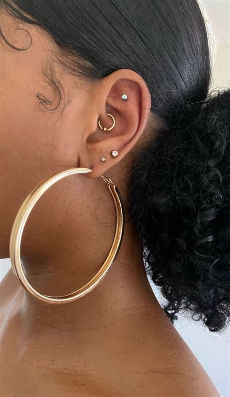 Pin By Candice Mkamburi On J E W E L R Y Pretty Ear Piercings