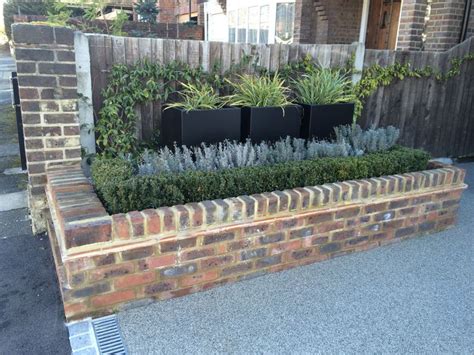 Raised Brick Bed With Buxus Hedge And Lavender Planters With Molinia