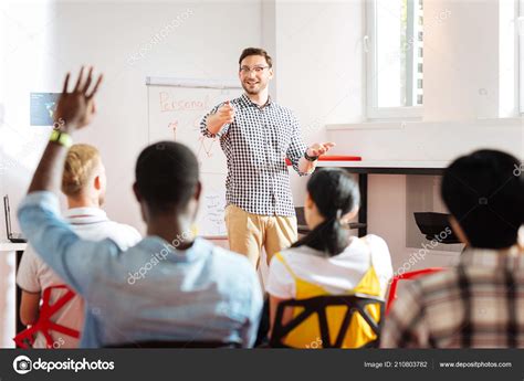 Student Raising Hand And Cheerful Speaker Pointing To Him — Stock Photo