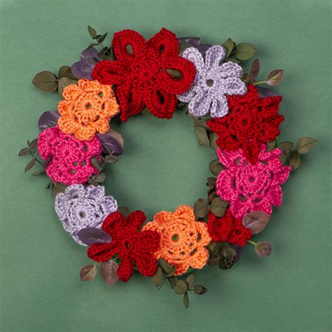 tutorial how to make a crocheted flower wreath wecrochet staff blog