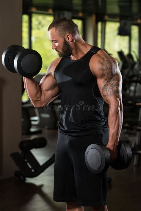 Bodybuilder Exercise Biceps With Dumbbells Stock Photo Image Of