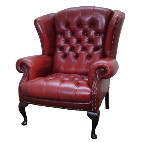 The swivel seat is padded with 2 of foam and covered with mesh upholstery. English Tufted Leather Chesterfield Wingback Chair | Chairish