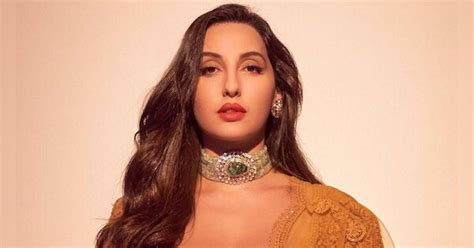 nora fatehi looking glamorous in white suit and dupatta nora fatehi photos व्हाइट सूट में कहर