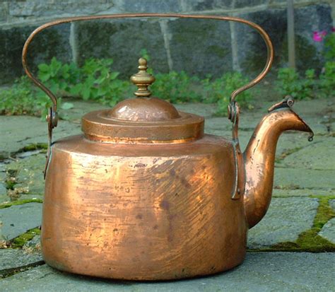Designed as a backdrop for photoshoots and weddings. Antique Copper Tea Kettle circa 1800