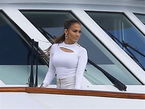 Niyama sol shagreen endless leggings in midnight. Jennifer Lopez photo shoot on a yacht with Casper Smart ...