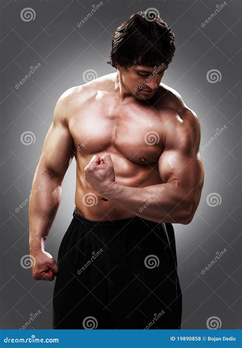 Bodybuilder Showing His Biceps Stock Photo Image Of Person Muscle