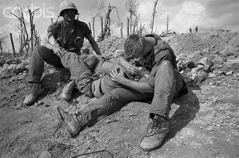 Khe Sanh Vietnam A Wounded United States Marine Is Held In The Arms