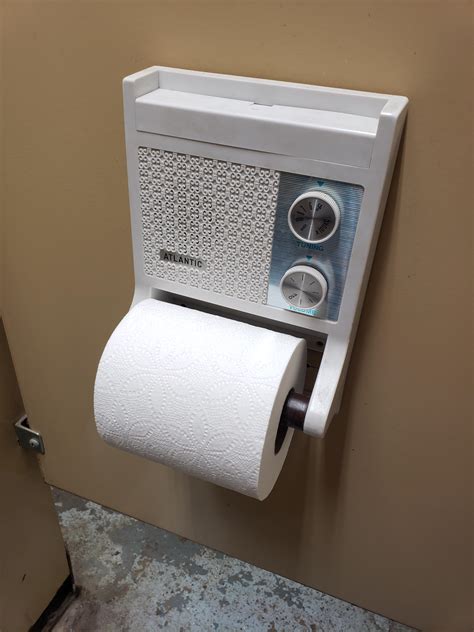 The Bathroom Im Using Has Toilet Paper Holders With Built In Radios In
