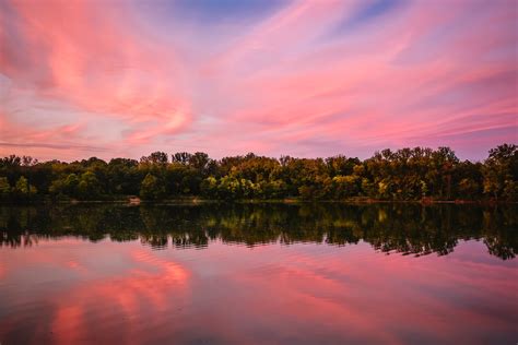 Trees Across Water During Sunset · Free Stock Photo