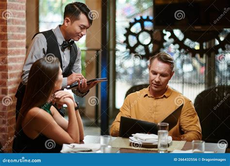 Ordering Food In Restaurant Stock Photo Image Of Elegant Confidence