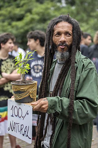 Natty Dreads Congo Bongo This Photo Of A King Holding A Plant And Sign