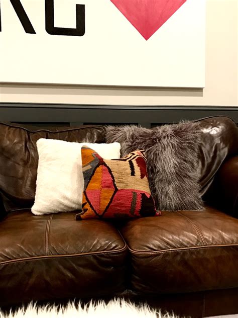 Shop leather sofa couches at luxedecor.com. Life Love Larson: Leather Sofas + Kilim Throw Pillows