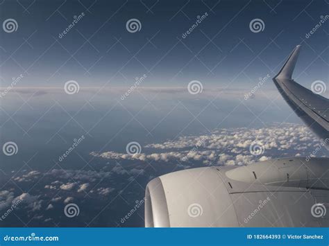 Clouds And Sky As Seen Through Window Of An Aircraft Stock Image