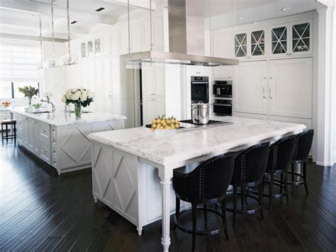 White kitchen island with wood countertop 15 Inspiring White Kitchens - Celebrate & Decorate
