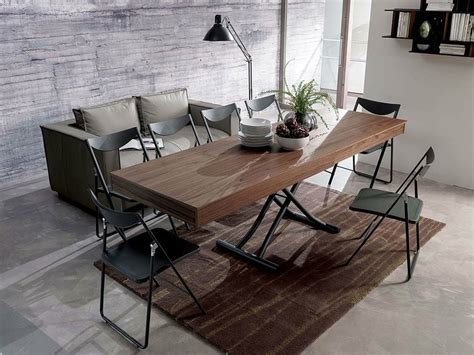Folding up the top, using the effortless gas lift mechanism, creates a dining table or desk surface and reveals a handy hidden storage area too! Height-adjustable folding coffee table NEWOOD Wooden ...