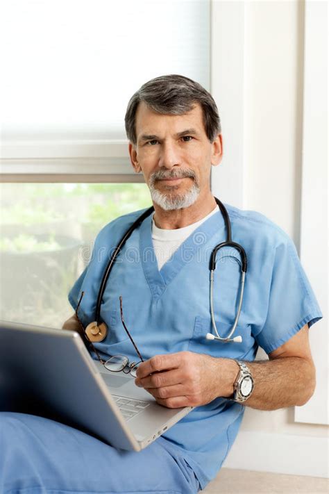 Male Doctor And Senior Patient Stock Photo Image Of Male Examination