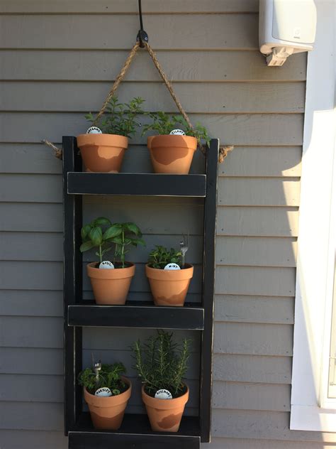 Hanging herb garden | Hanging herbs, Hanging herb garden, Planter pots