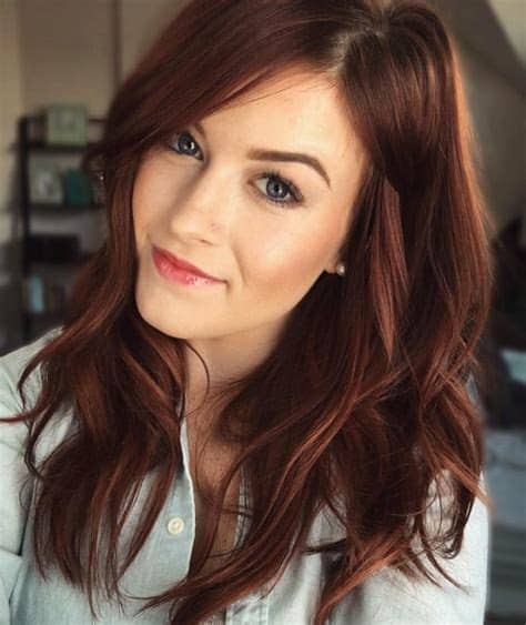 Wearing black hair with platinum highlights is a chic way to flaunt a dimensional color. 15 Auburn Hair Ideas For A Statement - Styleoholic