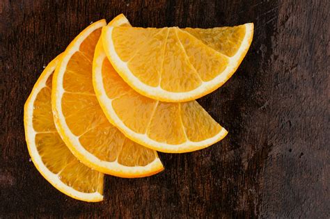 Slices Of Orange On Cutting Board · Free Stock Photo