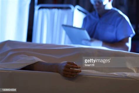Men In Morgue Photos And Premium High Res Pictures Getty Images