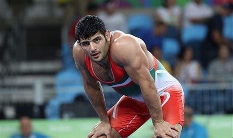 Iranian Wrestler Forced To Forfeit Fight So He Wouldnt Have To Fight