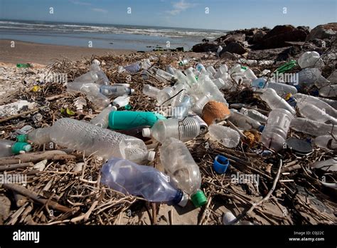 Plastic Bottles Litter The Beach On An Isolated Part Of South Padre