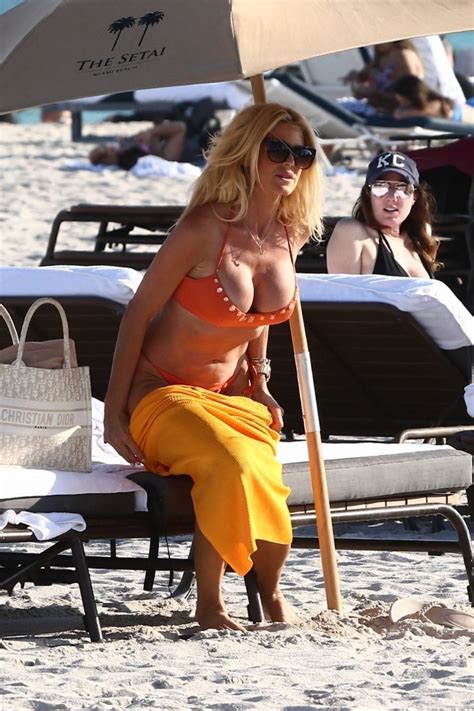 Victoria Silvstedt Slips Into An Orange Bikini While Soaking Up The Sun