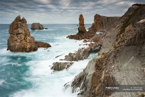 Waves Crashing On Rocky Cliffs — Rocks Travel Destination Stock