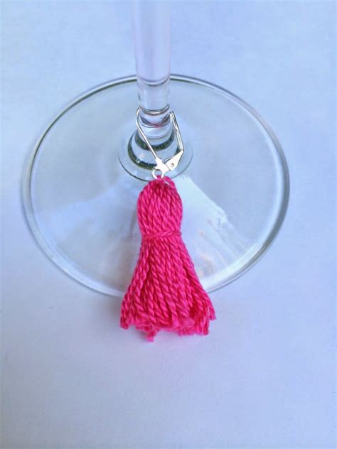 Video tutorial diy new years wine glass charms at inkandinspirations.com easy to create stemmed glassware charms for your new year's or other festive celebrations. DIY Wine Charm Tassels