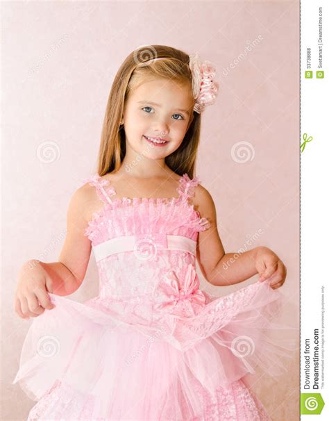 Portrait Of Cute Smiling Little Girl In Princess Dress