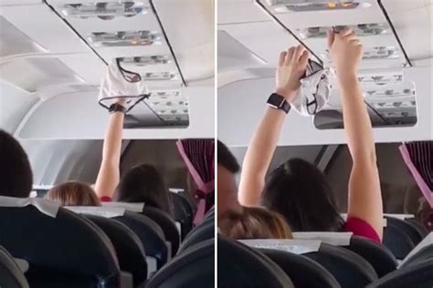 Bizarre Moment Female Air Passenger Is Caught On Camera Using An