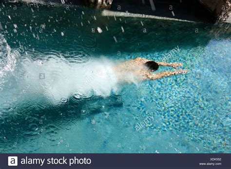 Woman Diving Into Pool And Underwater High Resolution Stock Photography