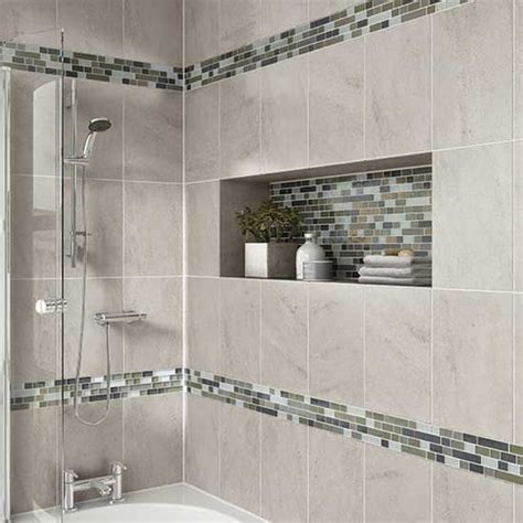 Tiles never wear out, and virtually will continue forever if they have been taken care of. Vertical tile layout with horizontal accent band in shower?