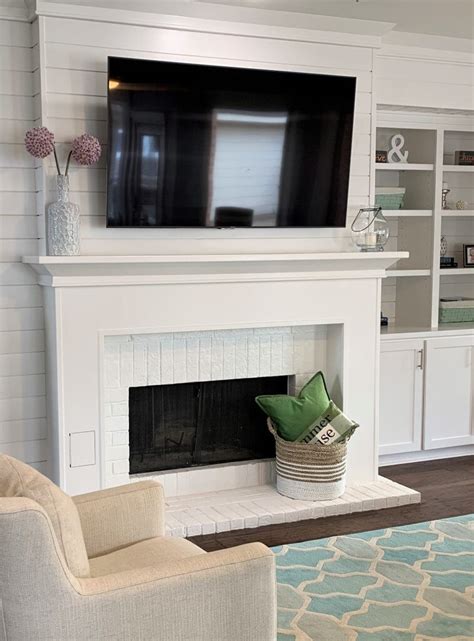 The brick fireplace remodel features contemporary style and adds subtle texture to the otherwise white room and furnishings. 23 Best Brick Fireplace Ideas to Make Your Living Room ...