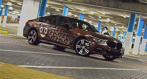 Poop Emoji Wrapped Bmw 7 Series Is A Truly Shtty Car Mod Carscoops