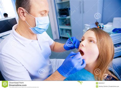 Dentist Treats Teeth Stock Image Image Of Smile Hospital 66063527