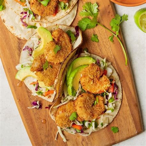 If you want these shrimp quesadillas to have a kick, go ahead and leave the jalapeño seeds and ribs intact. Popcorn Shrimp Tacos with Cabbage Slaw Recipe: How to Make ...