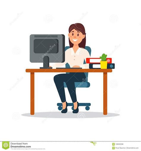 Smiling Businesswoman Sitting At The Desk Working With Computer