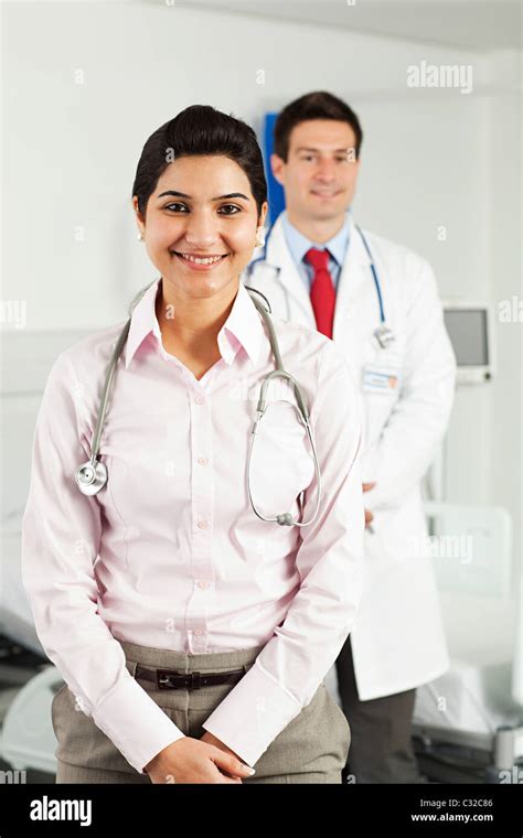 Portrait Of Male And Female Doctors Stock Photo Alamy