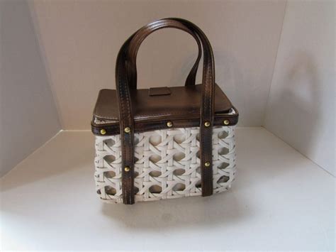 Deck boxes deliver convenience in storing accessories outside as opposed the inconvenience of predominantly available in java brown, occasionally white. White Wicker Box Purse with Faux Leather Buckles Encore ...