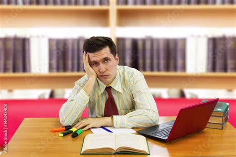 Young Man Student Feel Bored While Trying To Studying Entry Exams To