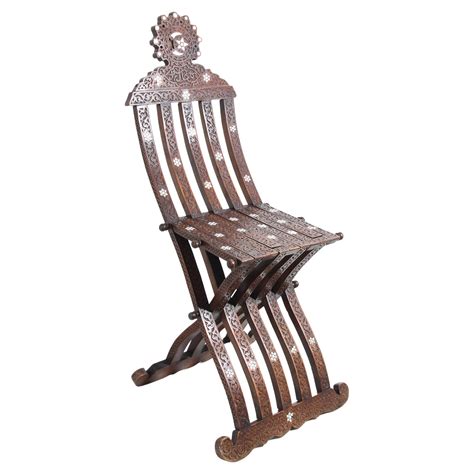 Pair Of Moroccan Carved Folding Chairs At 1stdibs