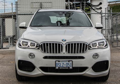 The x5 has been a universal garage door opener is now standard on the 2014 bmw x6. 2014 BMW X5 xDrive50i Review
