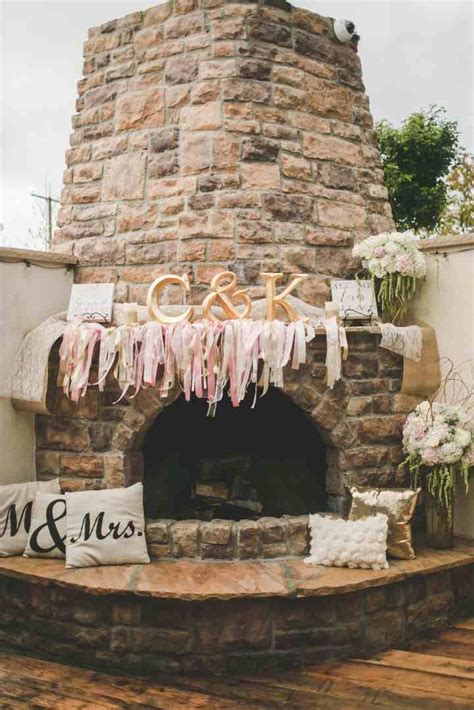 12 Ways to Decorate a Fireplace Mantel at Your Wedding - WeddingWire