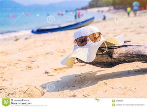 Hat And Sunglasses Lying On Tropical Sand Beach Sunglasses On The Beach