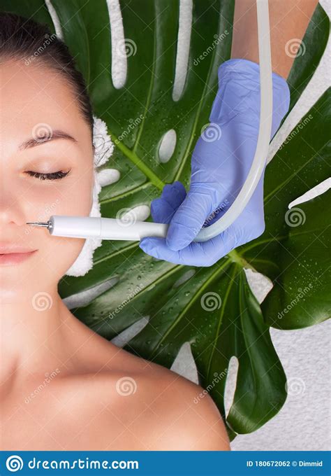 The Cosmetologist Makes The Procedure Treatment Of Couperose And Face