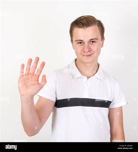 Portrait Of Cute Sixteen Year Old Boy In Studio Stock Photo Alamy