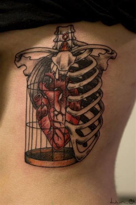 It doesn't matter what kind of feeling or thought you want to express with a tattoo — large picture on your rib cage will definitely attract attention of the people around you. 38 Anatomical Heart Tattoos | Amazing Tattoo Ideas