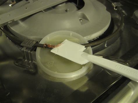 How to get melted plastic off glass stove top. How to remove melted plastic from the dishwasher | Melted ...