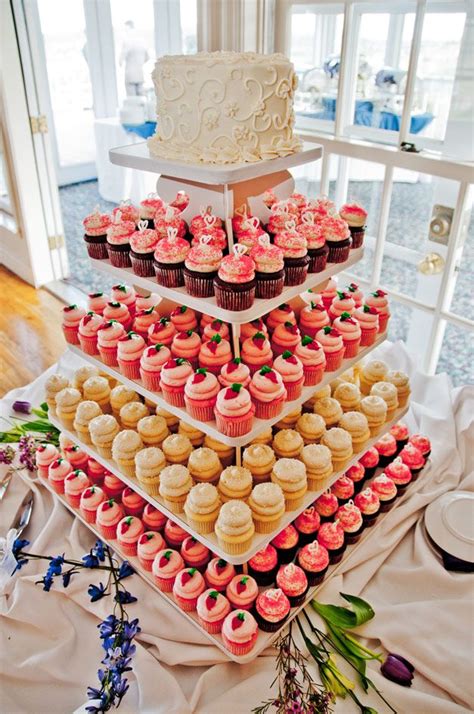Cupcake Tower Topped With Cake Wedding Desserts Wedding Cakes With